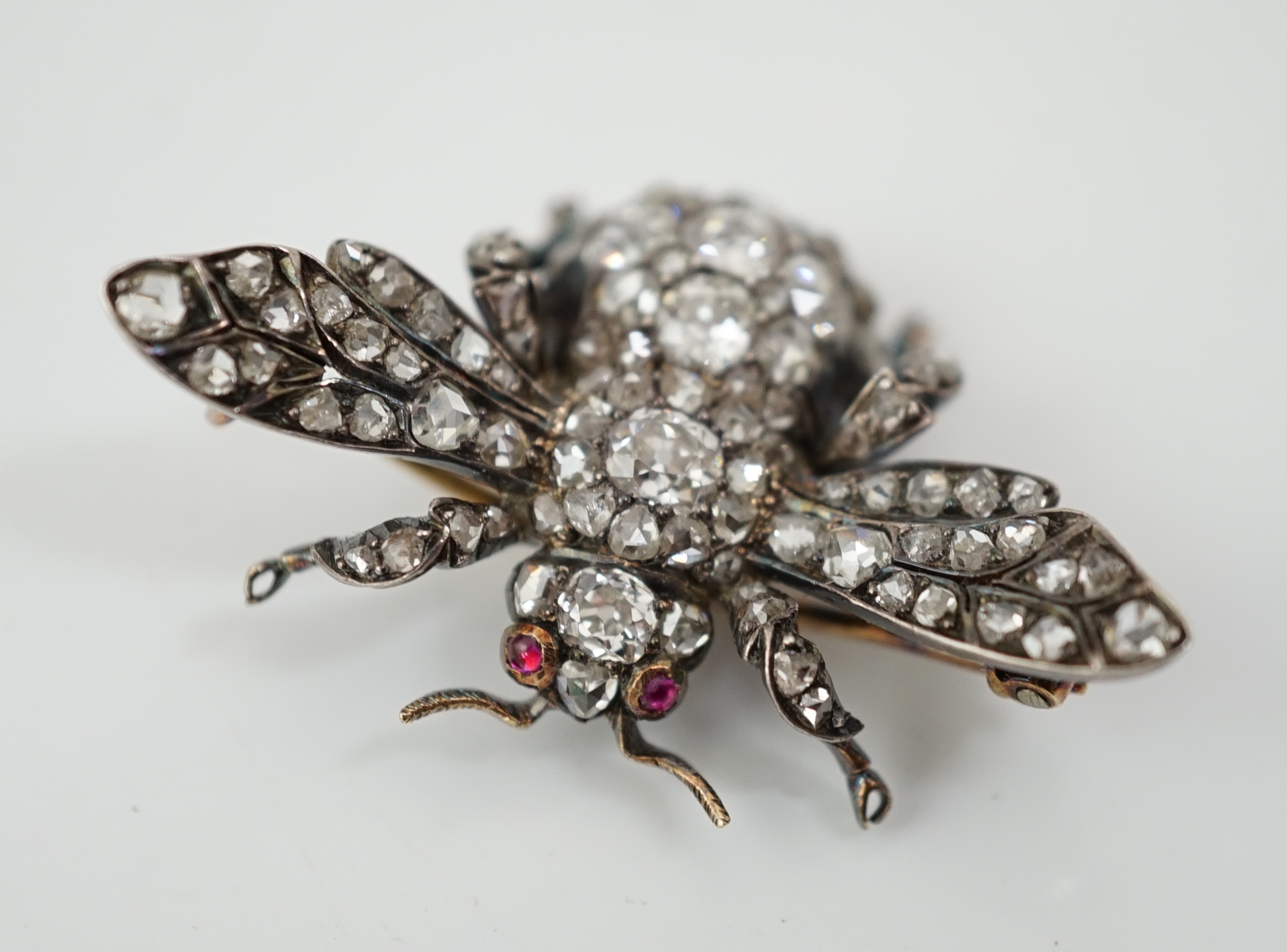 A Victorian gold, silver and diamond encrusted bee brooch